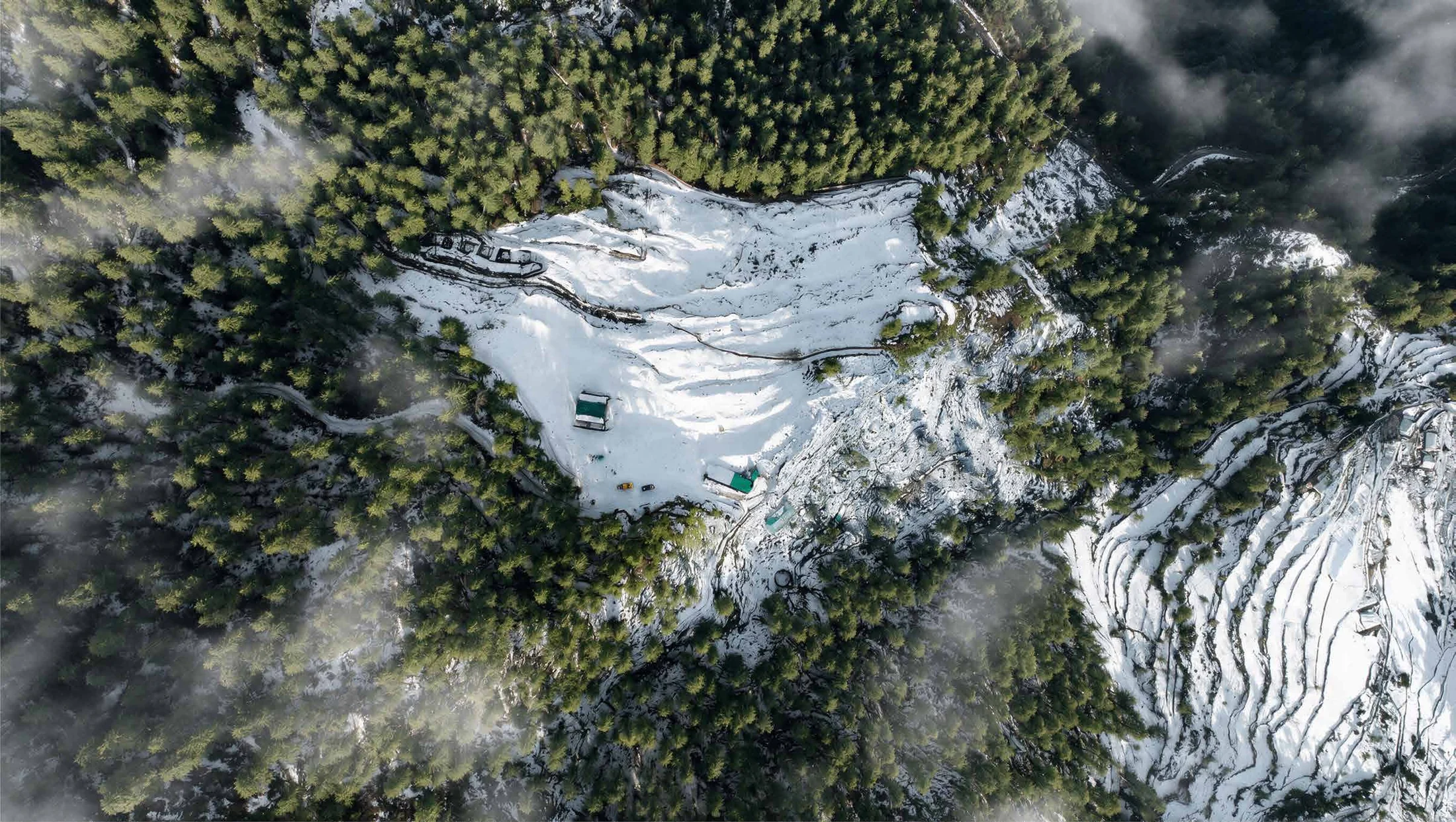 Abhinandan Lodha Shimla - The Ridge top-down aerial of the terraced Mashobra site in deodar forest